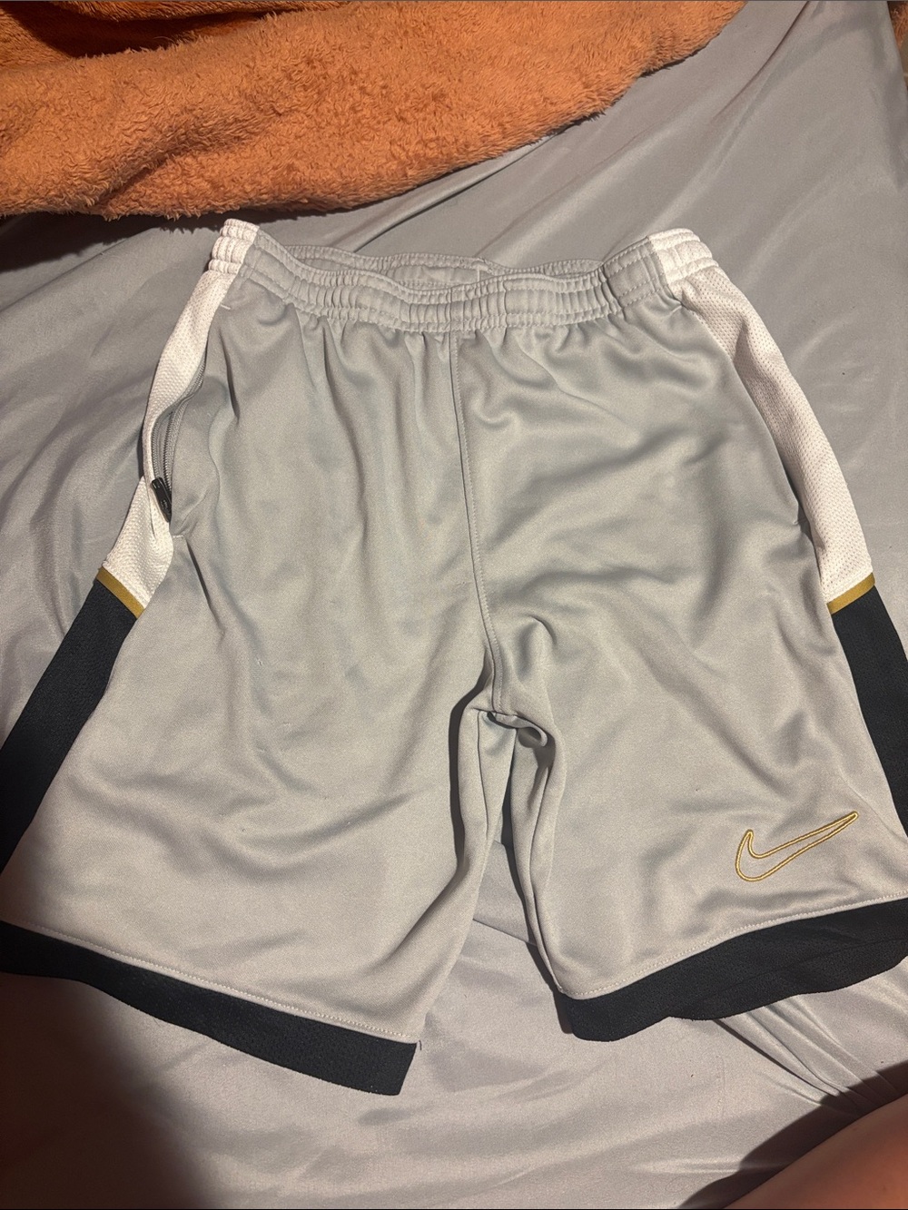 Nike Light Gray, Black and Gold Athletic Shorts